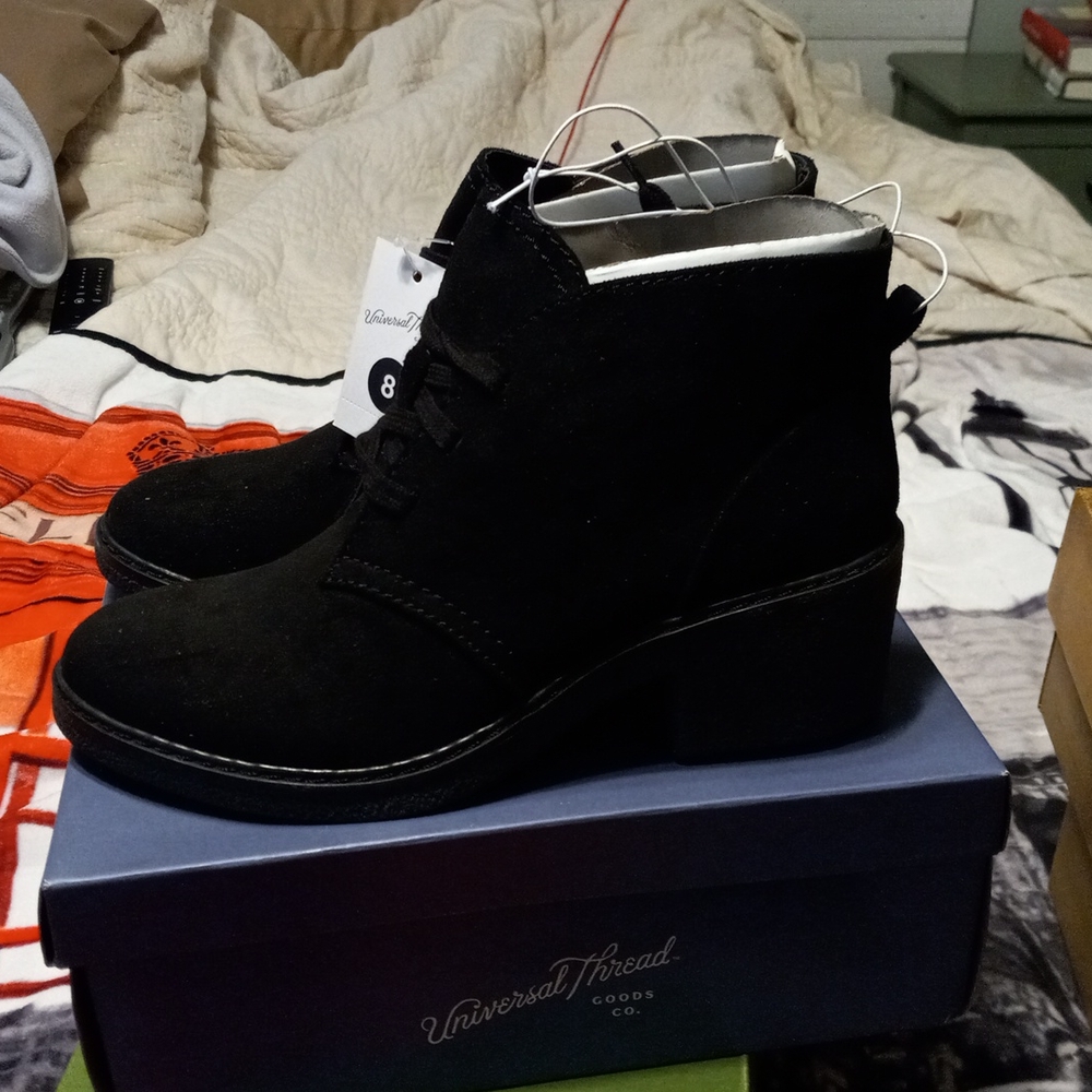 Brand new suede like boots in black.
